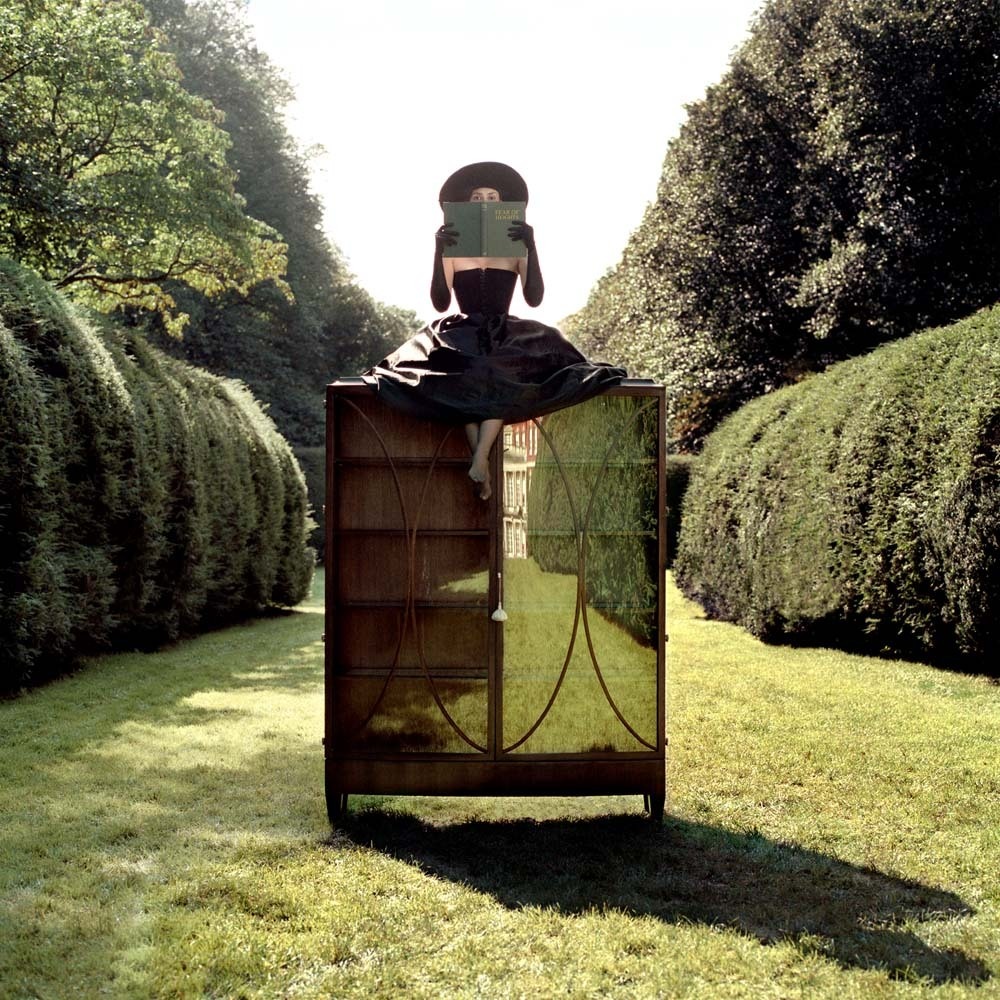Zoe Reading, Seated on Bookcase, Long Island, NY, 2004© Rodney Smith